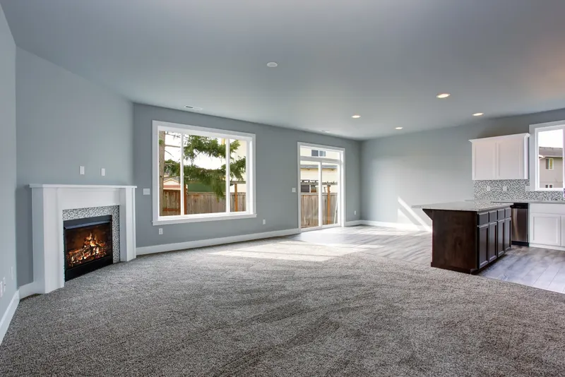 An empty rental with freshly cleaned carpet, ready for the walk-through